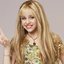 Miley Cyrus como "Hannah Montana" para o seriado de mesmo nome