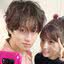 Heechul (Super Junior) e Momo (TWICE)