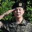 Jimin, do BTS, em sua dispensa militar
