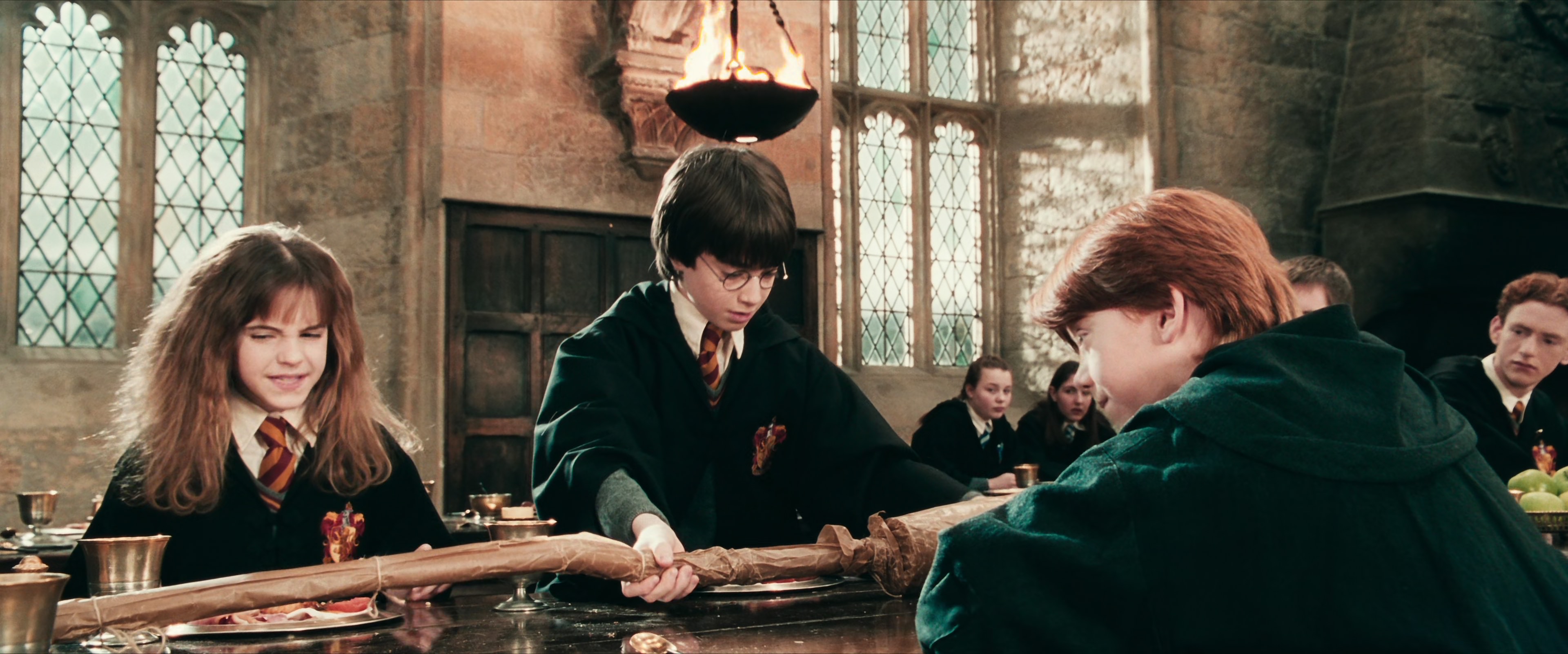 Harry Potter recebendo a Nimbus 2000